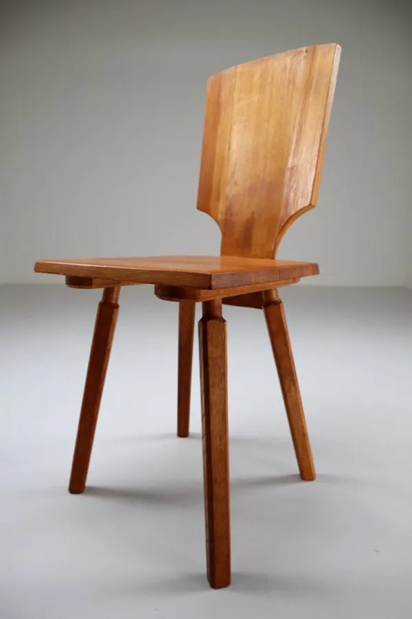 An elm chair with a single plank back