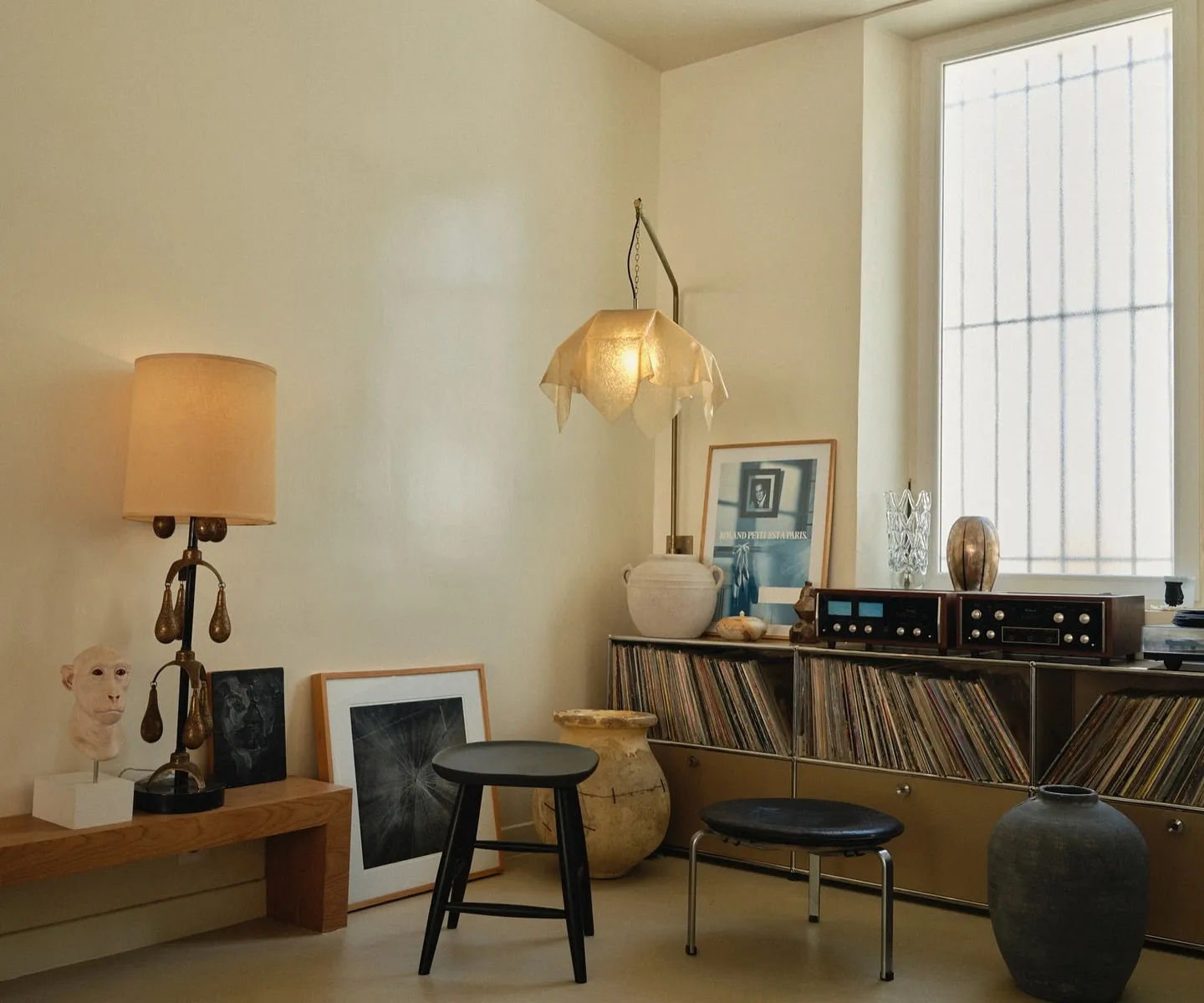 Beautifully composed living room with warm lighting and considered furniture