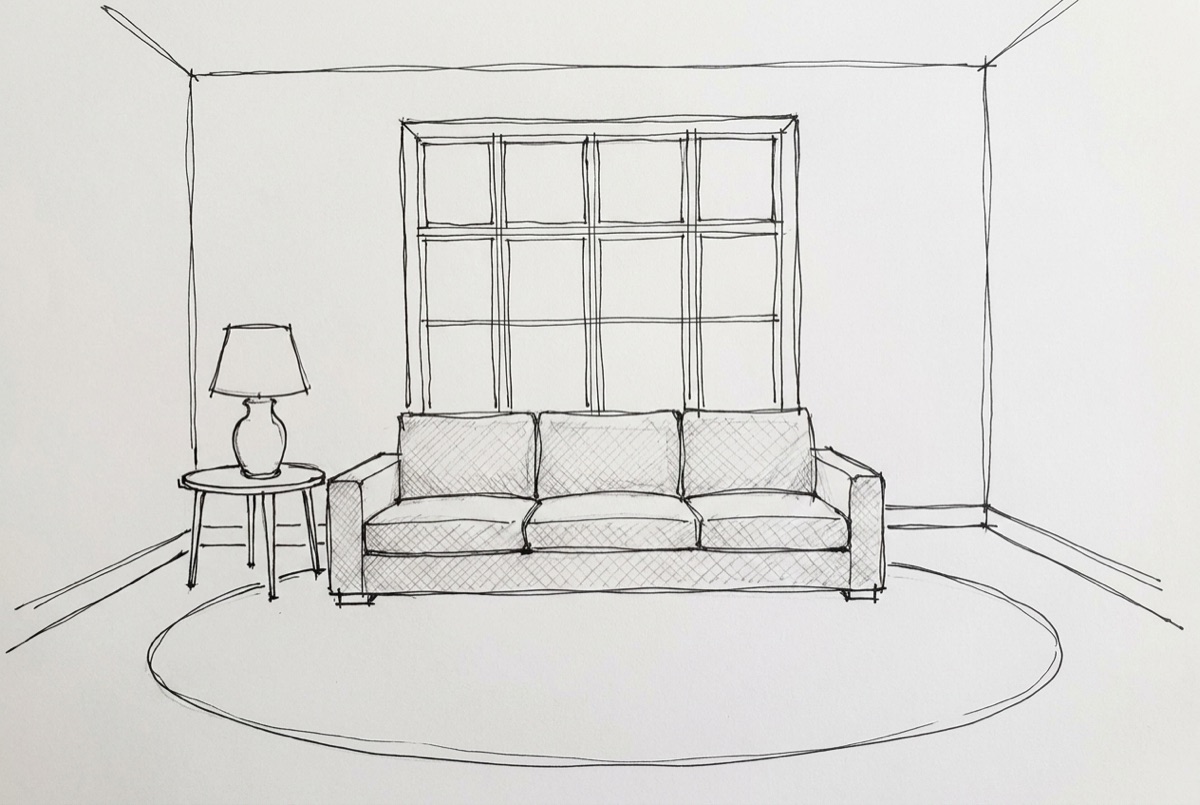 A living room sketched in pen: low sofa under a paned window, side table with a ceramic lamp